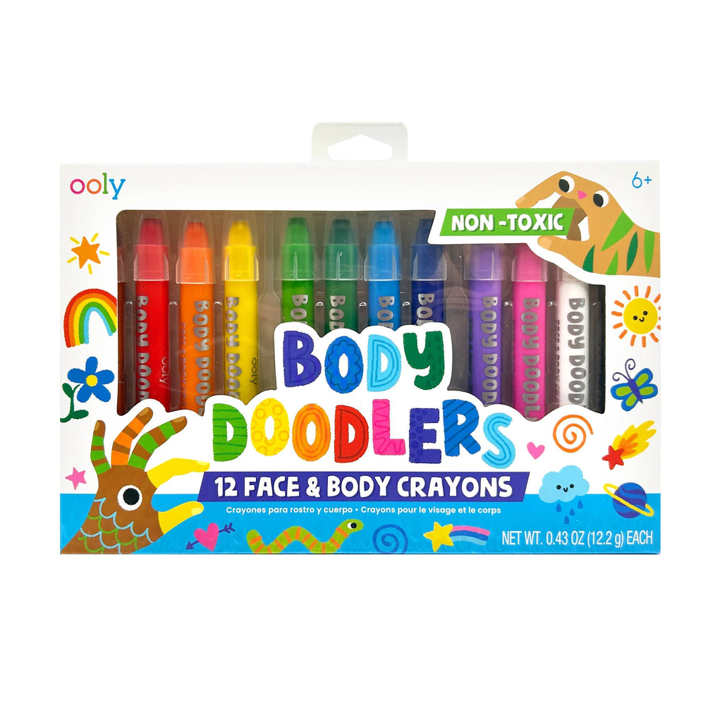 Ooly Body Doodlers 12 face and body crayons in a clear plastic window box with colorful cartoon illustrations on a white background.