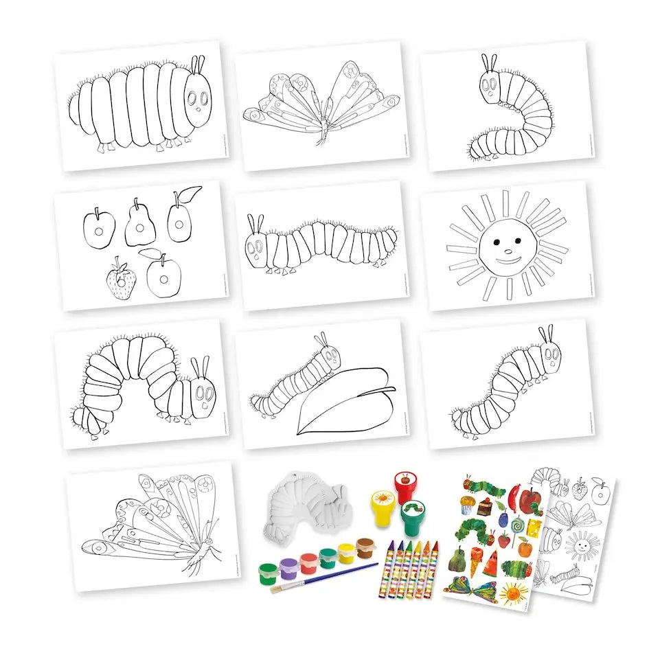 A children's coloring and painting kit laid out on a white background, featuring black-and-white caterpillar and butterfly line drawings, fruit illustrations, a sun face, a butterfly wing coloring page, a gray paper hat, small paint pots, crayons, and a few colored pencils.